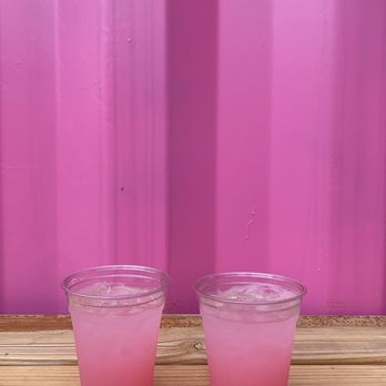 Recess Taco Park - two plastic cups with pink liquid - Tacos Near Me - Norman, Oklahoma Recess Taco Park - two plastic cups with pink liquid - Tacos Near Me - Norman, Oklahoma