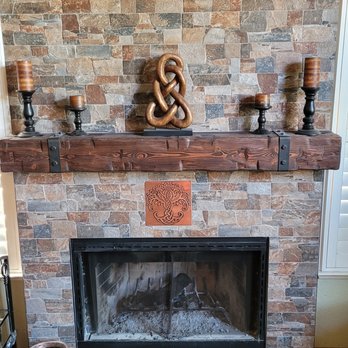 Banner Construction - This new hearth dramatically improved the great room.  Banner even installed a decorative copper tile we found, and it looks awesome. - General Contractors Near Me
