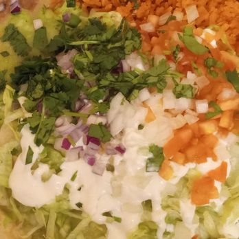 Puente Viejo Mexican Restaurant - Close up view of enchiladas suizas in green sauce - Seafood Near Me - Ogden, Utah Puente Viejo Mexican Restaurant - Close up view of enchiladas suizas in green sauce - Seafood Near Me - Ogden, Utah