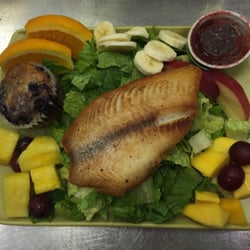 Noteworthy Sweets - Sunshine salad with tilapia and a homemade blueberry muffin.