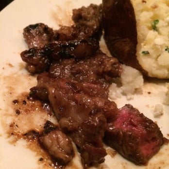 Outback Steakhouse - This was most of the fat that was cut off of my teriyaki "ribeye" I'm not sure, but that looks like a lot to me!!!  It was pretty gross. - Steakhouses Near Me - Oxnard, California