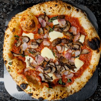 Brama - a pizza with mushrooms and cheese - Italian Near Me - Montreal, Quebec