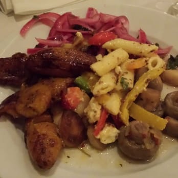 M Grill - Various items from the buffet/salad bar: garlic, onions, mushrooms, pasta salad, etc. - Brazilian Near Me - Los Angeles, California M Grill - Various items from the buffet/salad bar: garlic, onions, mushrooms, pasta salad, etc. - Brazilian Near Me - Los Angeles, California
