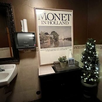 Kunjani World Coffeehouse - Decor in women's room - Coffee & Tea Near Me - Parker, Colorado Kunjani World Coffeehouse - Decor in women's room - Coffee & Tea Near Me - Parker, Colorado