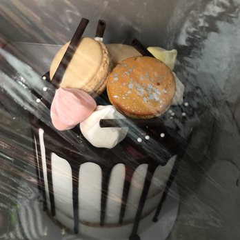 A Cake Life - Flash Cake Friday Sale: Coconut cake with coconut cream filling. - Bakeries Near Me - Honolulu, Hawaii A Cake Life - Flash Cake Friday Sale: Coconut cake with coconut cream filling. - Bakeries Near Me - Honolulu, Hawaii
