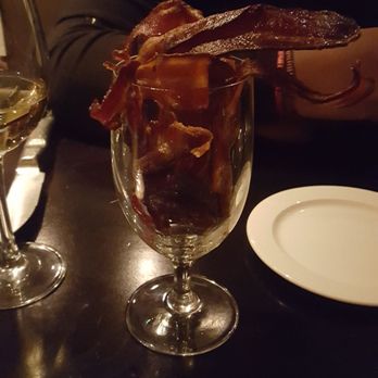 Prime One Twelve - Bacon in a glass! A bar snack, but ask your waiter about it and they'll bring you some over. - Steakhouses Near Me - Miami Beach, Florida Prime One Twelve - Bacon in a glass! A bar snack, but ask your waiter about it and they'll bring you some over. - Steakhouses Near Me - Miami Beach, Florida