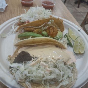 Rubio's Coastal Grill - Black burned Mahi Mahi taco. I think they tried to hide it being burned by pouring excessive sauce on it. - Mexican Near Me - Gilbert, Arizona