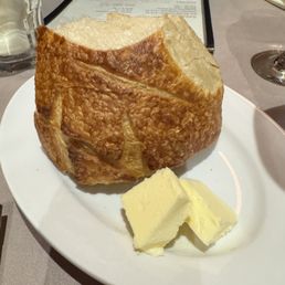 Complimentary sourdough bread (one slice off the top already taken) Complimentary sourdough bread (one slice off the top already taken)