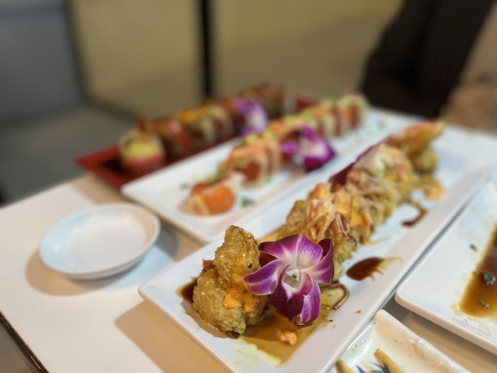 Memo's Sushi Logo
