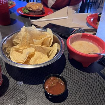 The Garage - Chips with salsa and queso were great as an appetizer. - Burgers Near Me - Del City, Oklahoma