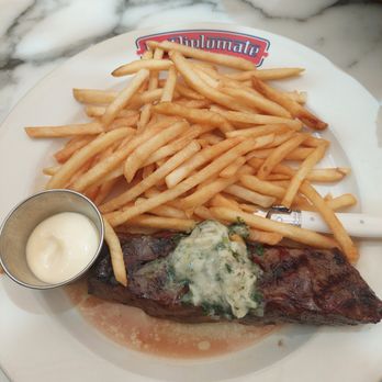 Le Diplomate - steak and (fries) Frites    herb roasted, maître d' butter, pommes frites - Brasseries Near Me - Washington, DC, District of Columbia