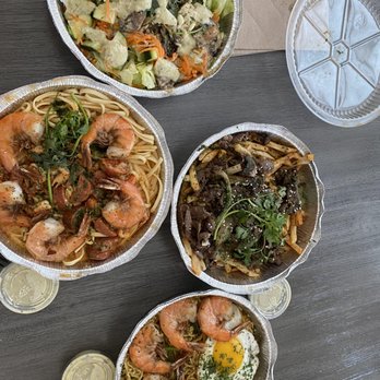 Nguyen's Kitchen - Order from top to bottom: Chicken salad, crawfish pasta with jumbo shrimp, garlic fries with steak, garlic noodles with jumbo shrimp & egg. - Vietnamese Near Me - Orange, California