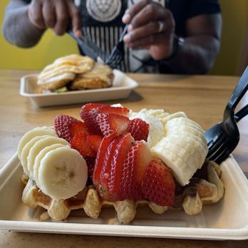 Waffle Love - West Jordan - Nutella waffle with fresh strawberries and banana! Look at that fruit, just perfect! - Waffles Near Me - West Jordan, Utah Waffle Love - West Jordan - Nutella waffle with fresh strawberries and banana! Look at that fruit, just perfect! - Waffles Near Me - West Jordan, Utah