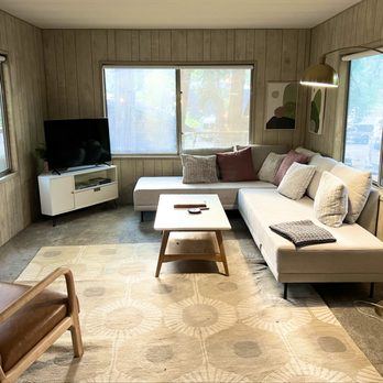 Cave Springs Resort - Living room in Walnut Cabin. Large and spacious but truly mid century vintage bathroom and kitchen. - Hotels Near Me - Dunsmuir, California