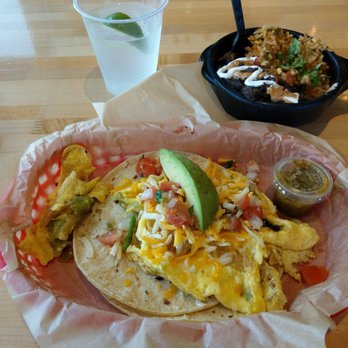 Torchy's Tacos - Migas taco with a side of rice and beans. 2pm breakfast. I was able to make two tacos out of it. - Tex-Mex Near Me - Amarillo, Texas Torchy's Tacos - Migas taco with a side of rice and beans. 2pm breakfast. I was able to make two tacos out of it. - Tex-Mex Near Me - Amarillo, Texas