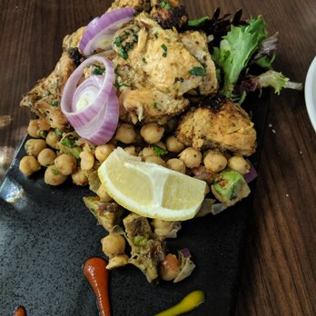 Chimney Indian Kitchen + Bar - Murgh masala on channa masala and avocado mixture - Indian Near Me - Chapel Hill, North Carolina Chimney Indian Kitchen + Bar - Murgh masala on channa masala and avocado mixture - Indian Near Me - Chapel Hill, North Carolina