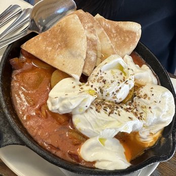 The Common - 3 Poached Eggs Skillet in African Spiced Stew - Breakfast & Brunch Near Me - Brooklyn, New York The Common - 3 Poached Eggs Skillet in African Spiced Stew - Breakfast & Brunch Near Me - Brooklyn, New York