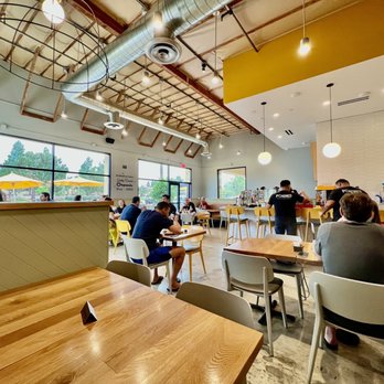 Poached Kitchen - Dining hall. Once at capacity, the sound decibels increase from all the conversations happening concurrently. - Breakfast & Brunch Near Me - Irvine, California