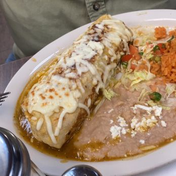 Macho’s Grill - Steak burrito suizo green salsa - Mexican Near Me - Forest Park, Illinois Macho’s Grill - Steak burrito suizo green salsa - Mexican Near Me - Forest Park, Illinois