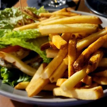 Cook & Craft - High Street - There's a great burger burried under these awesome fries - New American Near Me - Phoenix, Arizona