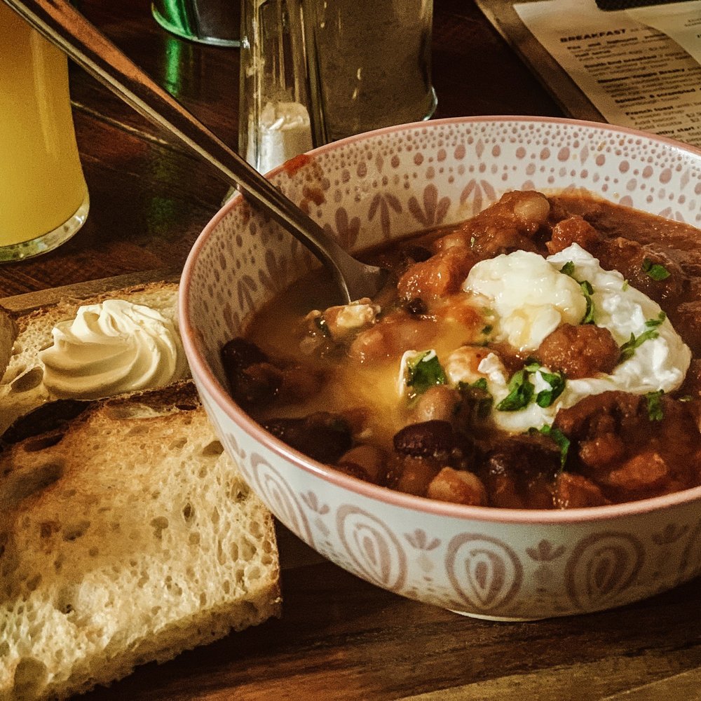 South End Cafe - Baked bean and Lentil Soup with a poached egg and chives served with a side of buttered toast. - Cafes Near Me - Sydney, NSW South End Cafe - Baked bean and Lentil Soup with a poached egg and chives served with a side of buttered toast. - Cafes Near Me - Sydney, NSW