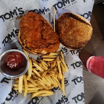 Tom's Watch Bar - Chicken sandwich with fries. - Sports Bars Near Me - Washington, DC, District of Columbia