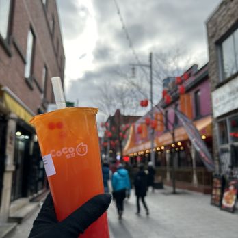 CoCo - a person holding a cup of iced tea on a city street - Bubble Tea Near Me - Montreal, Quebec CoCo - a person holding a cup of iced tea on a city street - Bubble Tea Near Me - Montreal, Quebec