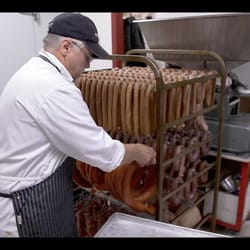 Eastend Meats & Sausage - Loading up the sausage for the smoker.