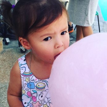 Love Swirls - a little girl holding a pink cotton candy - Photo Booth Rentals Near Me - Highland Park, California Love Swirls - a little girl holding a pink cotton candy - Photo Booth Rentals Near Me - Highland Park, California