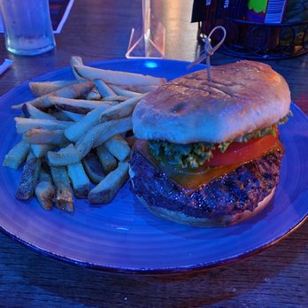 Ground Zero Blues Club - Burger under low light of facility - Music Venues Near Me - Biloxi, Mississippi