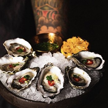 Toca Madera Scottsdale - Oysters on the Half Shell- chef's oyster selection by the half dozen, fresno chile, finger lime caviar, pepper & cilantro mignonette. - Mexican Near Me - Scottsdale, Arizona