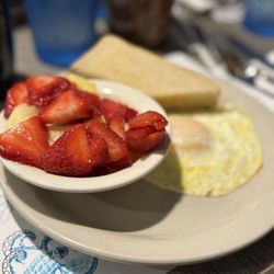 Deja Vu - Eggs, toast and mixed fruit