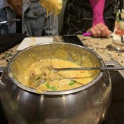 Photo of The Melting Pot - Bedford, MA, United States. Loaded Baked Potato Cheddar