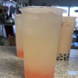 Harvest Fruit and Boba Tea - Regular lemonade with strawberry popping boba and a earl grey milk tea with boba