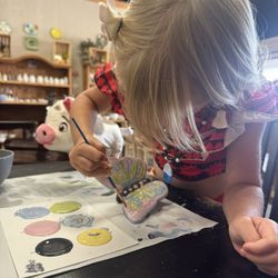 The Potter’s Cottage - Painting a butterfly