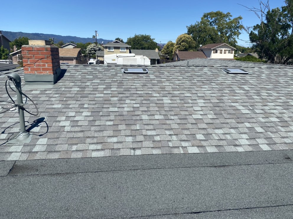 Slide of Tip Top Roofing