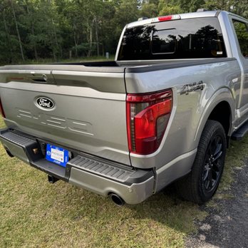 J C Lewis Ford - Dual exhaust special lift tailgate and some 20" tires with black wheels - Car Dealers Near Me - Savannah, Georgia J C Lewis Ford - Dual exhaust special lift tailgate and some 20" tires with black wheels - Car Dealers Near Me - Savannah, Georgia