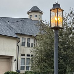 Sam Michael's Roofing & Construction - New 6" K-style bronze gutters installed on a home in the Bentwater neighborhood of Montgomery, TX