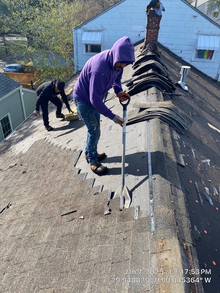 Slide of Voodoo Roofing