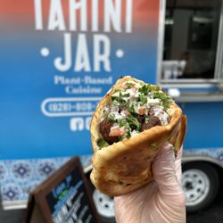 Tahini Jar - Our delicious falafel pita stuffed to the brim with fresh and delicious ingredients.