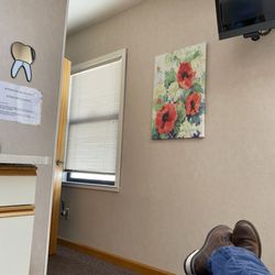 Lindsey Koida DDS & Norman Burg DDS - Teeth cleaning area with TV