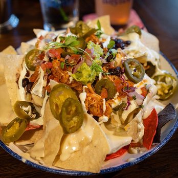 Savannah Tequila - Chicken Tinga Nachos - Mexican Near Me - Savannah, Georgia Savannah Tequila - Chicken Tinga Nachos - Mexican Near Me - Savannah, Georgia