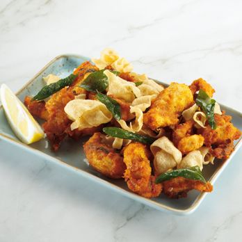 Tamarind Tales - Chicken 65 - Indian spiced fried chicken, curry leaves - Indian Near Me - Vancouver, British Columbia Tamarind Tales - Chicken 65 - Indian spiced fried chicken, curry leaves - Indian Near Me - Vancouver, British Columbia