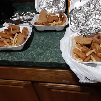 Pizza Land - a variety of food items on a counter - Pizza Near Me - Caledonia, New York