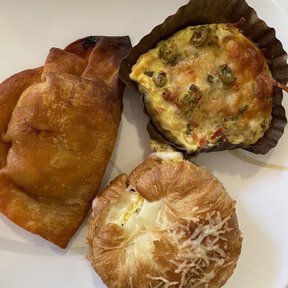 (Clockwise) Chorizo egg empanada, Mozzarella olive mixed quiche and SEC croissant (Clockwise) Chorizo egg empanada, Mozzarella olive mixed quiche and SEC croissant
