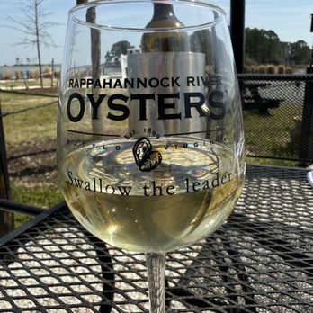 Merroir - Glass of wine and the view. - Seafood Near Me - Topping, Virginia
