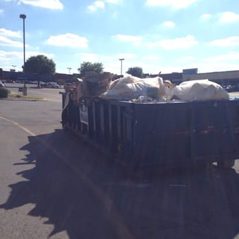 Schlotzsky's - Trash bin located next to drive thru. - Sandwiches Near Me - Waxahachie, Texas