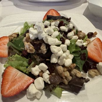 La Nonna Bella - Mescaline salad with candy walnuts, goat cheese, cranberries ,crispy, prosciutto, and strawberries. - Italian Near Me - Garden City, New York