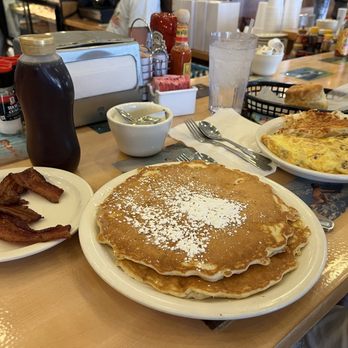 Donut Hole Bakery Cafe - "Short stack" of delicious pancakes with side bacon & monster omelette!! Yummy yummy ! - Donuts Near Me - Destin, Florida Donut Hole Bakery Cafe - "Short stack" of delicious pancakes with side bacon & monster omelette!! Yummy yummy ! - Donuts Near Me - Destin, Florida