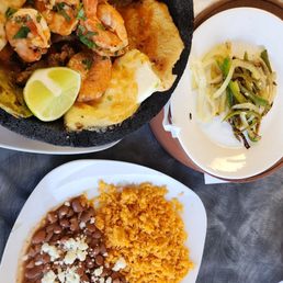 molcajete with onions and jalepeno cooked well on the side molcajete with onions and jalepeno cooked well on the side